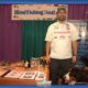 Man at Blind Fishing Boat booth display.
