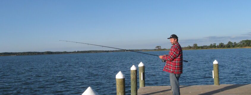 Lawrence fishing on Chesapeake Pier