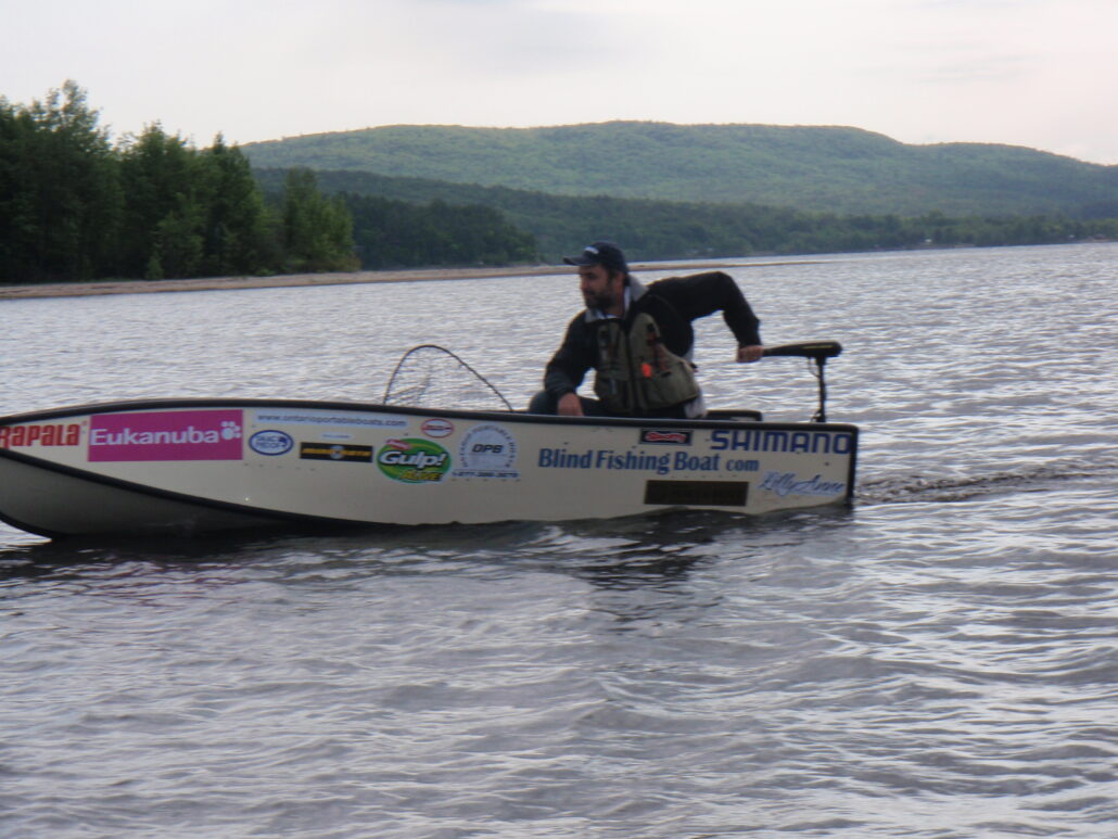 Lawrence aboard the world’s first fishing boat for the blind