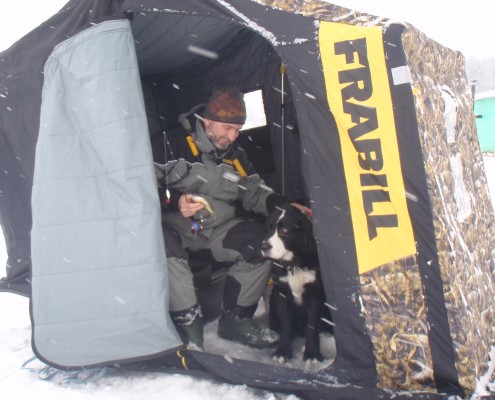 A group of people sitting and interacting on a bus with a Fratelli sign.