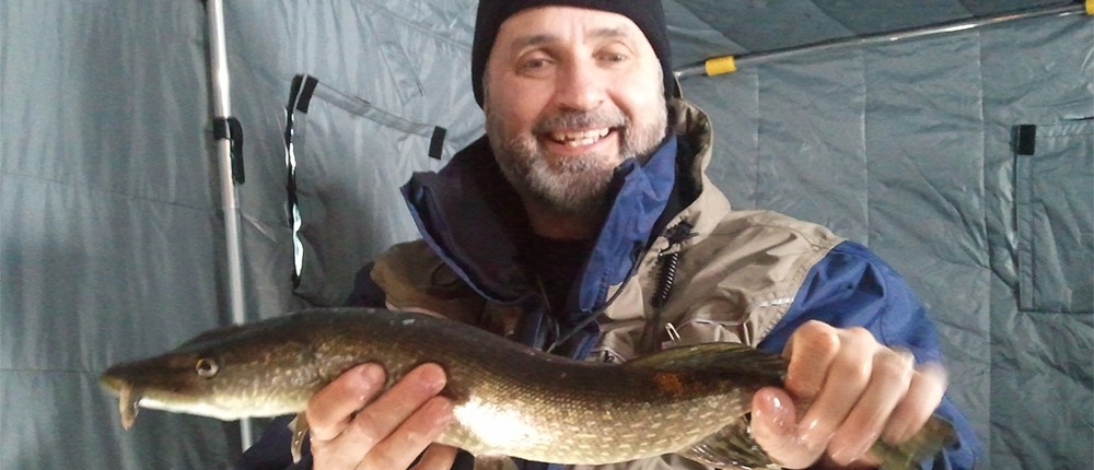 Lawrence holding a Pike