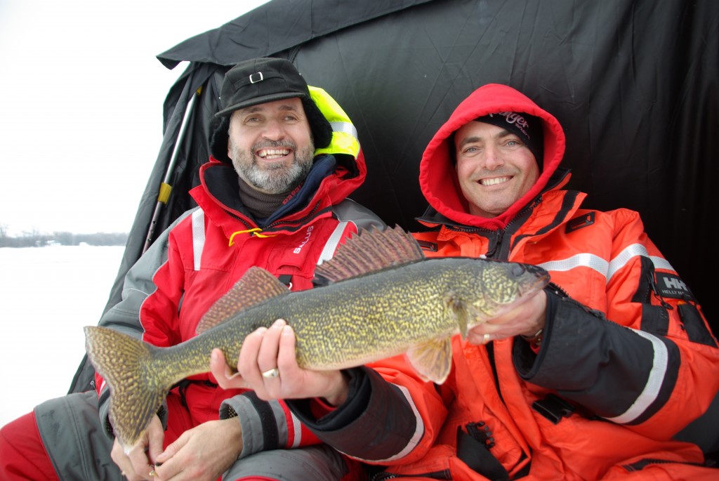 scott_holding_fish_with_lawrence-1024x685